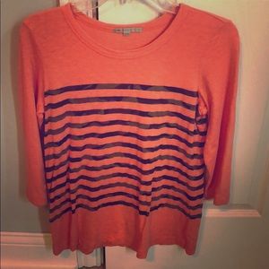 Cute 3/4 sleeve orange top with camo stripes.😱